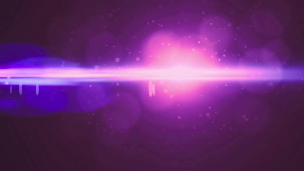 Abstract Purple and Pink Lens Flare Moving Across Dark Background