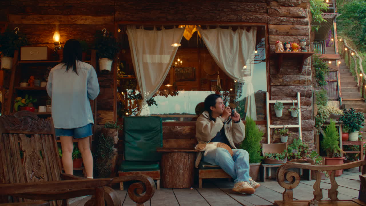 Couple enjoying a quiet moment in a cozy outdoor cafe