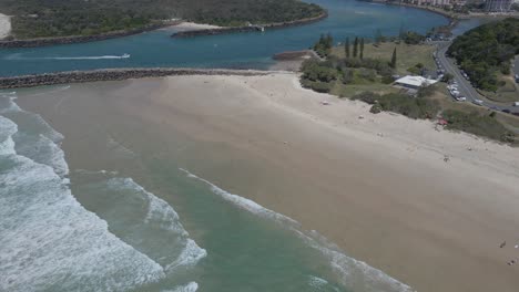 Sandy-Seashore-Of-Duranbah-Beach-And-Blue-Waterscape-Of-Tweed-River-In-Gold-Cost,-QLD,-Australia
