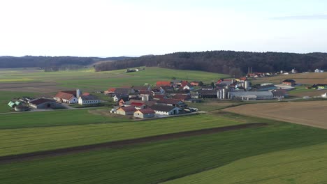 aerial view of slovenian countryside, agricultural landscape in spring, small village in europe