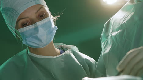 surgeons performing operation