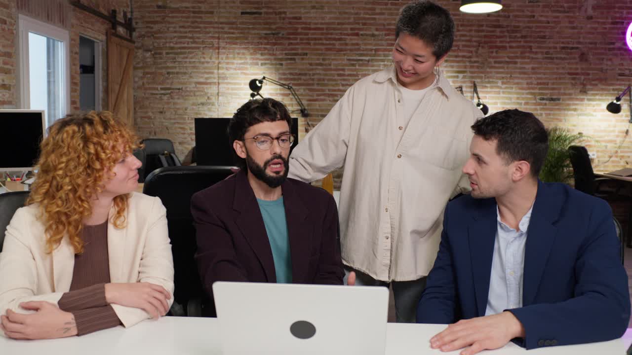 Group of coworkers collaborating in an office