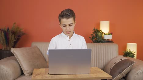 Boy-playing-games-at-home.