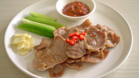 grilled pork neck sliced on plate in asian style