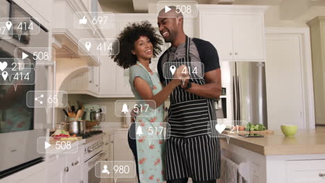 home cooks dancing in kitchen, showcasing floating social media marketing icons and smartphone