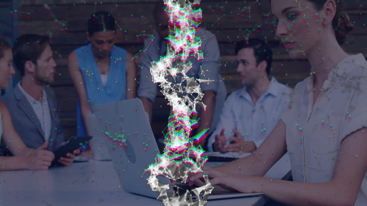 Coworkers gathering around table in office, displaying digital network overlay for tech discussion