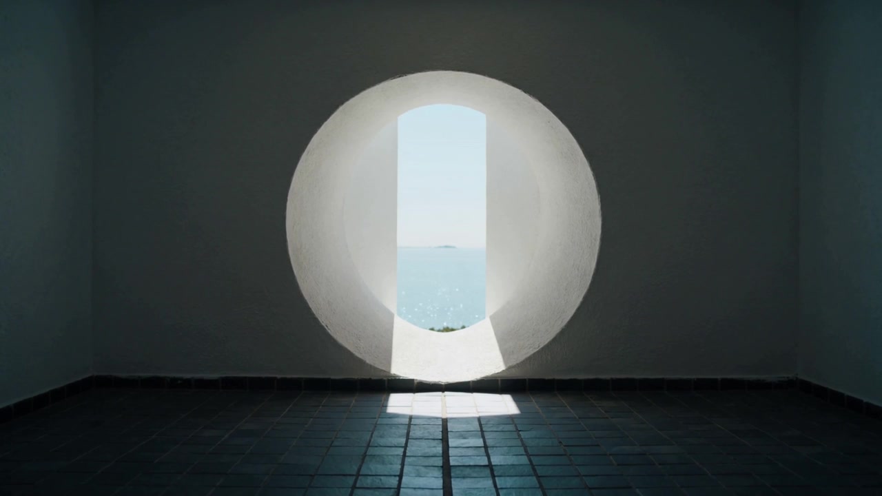Sun moving, sunlight crossing circular aperture in white room revealing sea and boat marking time