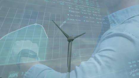 Animation-Von-Finanzdaten-Und-Geschäftsmann-über-Windkraftanlage