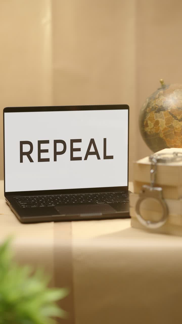VERTICAL VIDEO OF REPEAL DISPLAYED IN LEGAL LAPTOP SCREEN