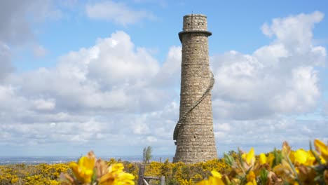 Ruin-Of-Flue-Chimney-And-Gorse-Bushes-On-Carrickgollogan-Hill-In-Dublin,-Ireland