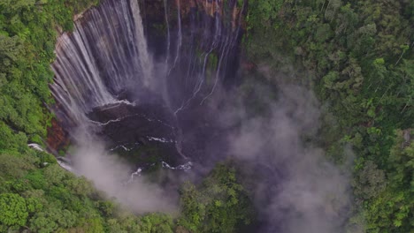 Magical-Tumpak-Sewu-Thousand-Waterfalls-in-Indonesia,-aerial