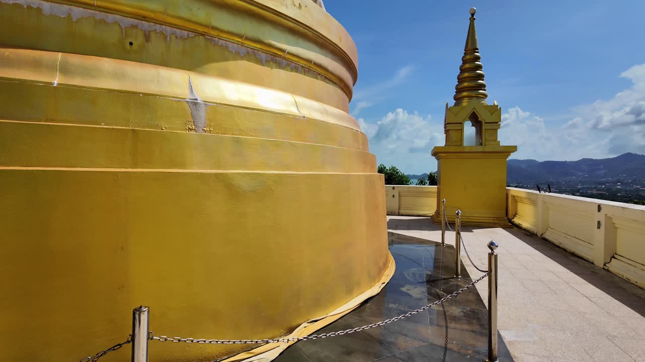 Buddhist temple pagoda golden color plated Chedi Wat Khao Hua Chuk Thailand