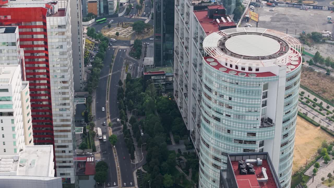 Aerial drone view of Santa Fe's main avenue, surrounded by skyscrapers, Mexico City