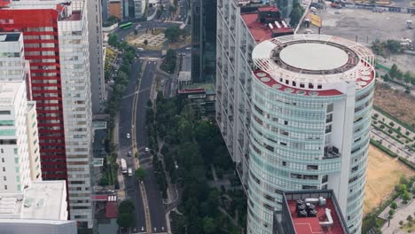 aerial drone view of santa fe's main avenue, surrounded by skyscrapers, mexico city