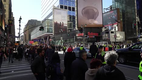 crowds gather in new york, their energy palpable as they show their support for trump under the bright afternoon sun