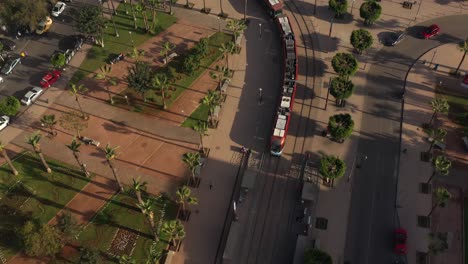 aerial view of a tramway arriving to the station in casablanca