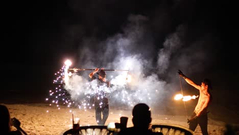 fire performers entertain on a krabi beach