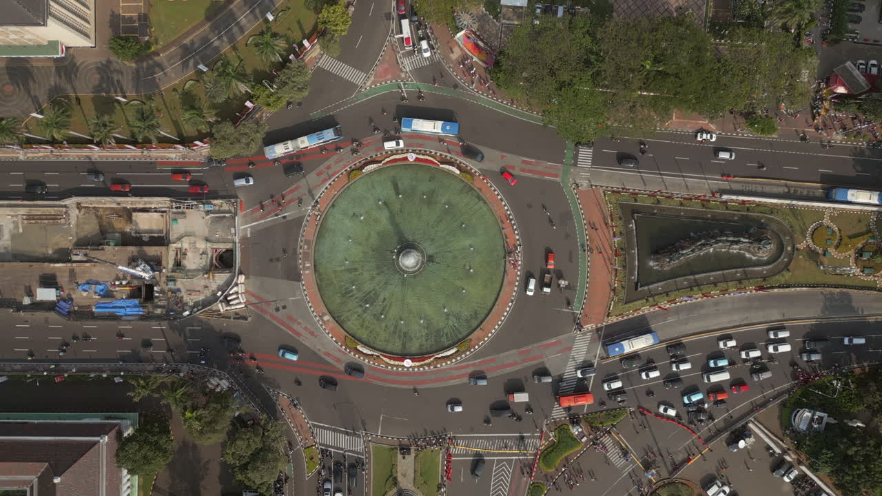 Thamrin Fountain Morning Traffic Drives Around It Jakarta Indonesia Drone Birdseye 4K 60FPS
