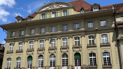 historic building of valiant bank in bern city during sunny day. city center of switzerland.wide shot. beautiful architecture design.