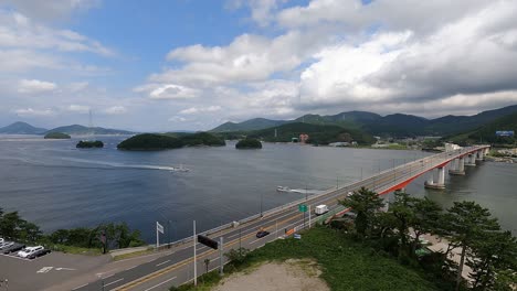 geoje bridge with daytime traffic in geojedo island, south korea