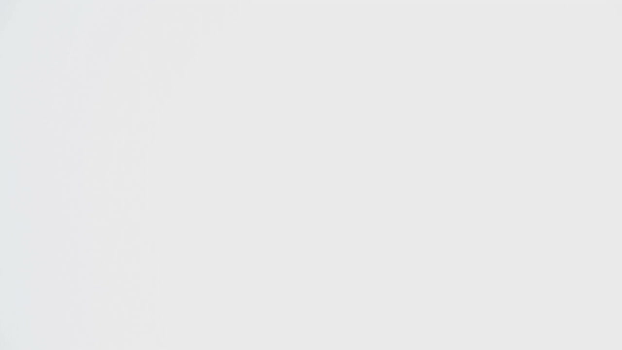 Happy graduated student throwing her cap