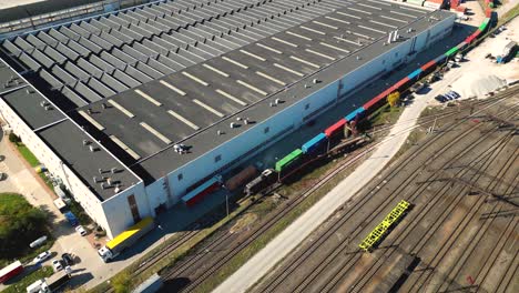 Aerial-view-of-shipping-containers,-semi-trucks-cargo-distribution-of-containers