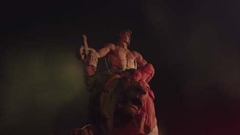 epic, ancient stone statue at night