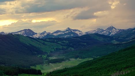 Aerial-of-the-Rocky-Mountains-under-a-moody-sky-as-seen-from-Crested-Butte-near-Boulder,-Colorado,-USA