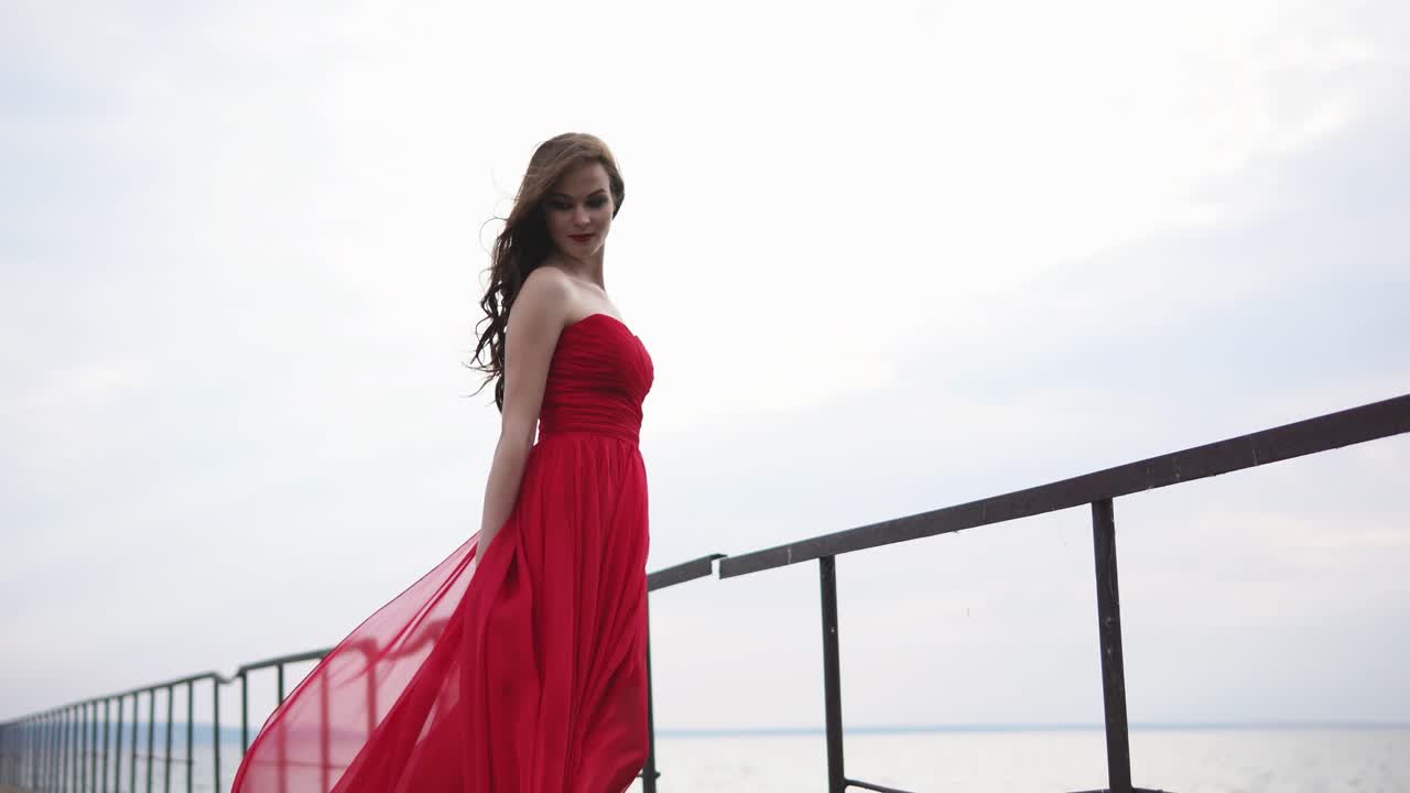 Woman in Red Dress by the Lake