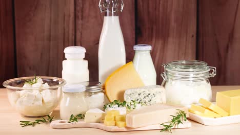 various dairy items displayed on a wooden surface