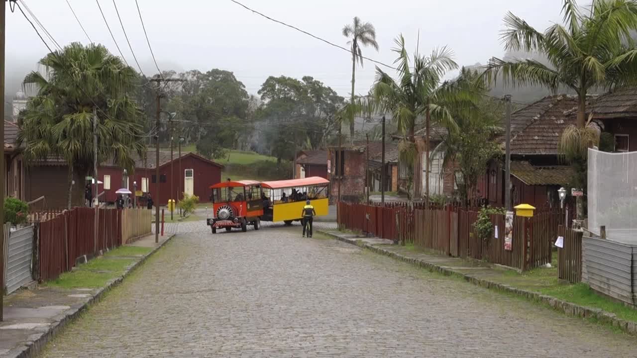 tram running through the old streets of Paranapiacaba village, Santo Andre, Brazil