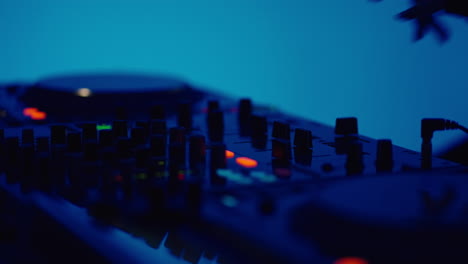 close-up shot of a dj mixer