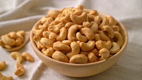 cashew nuts in wooden bowl