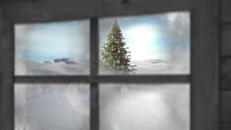 Wooden window frame against snow falling over christmas tree on winter landscape