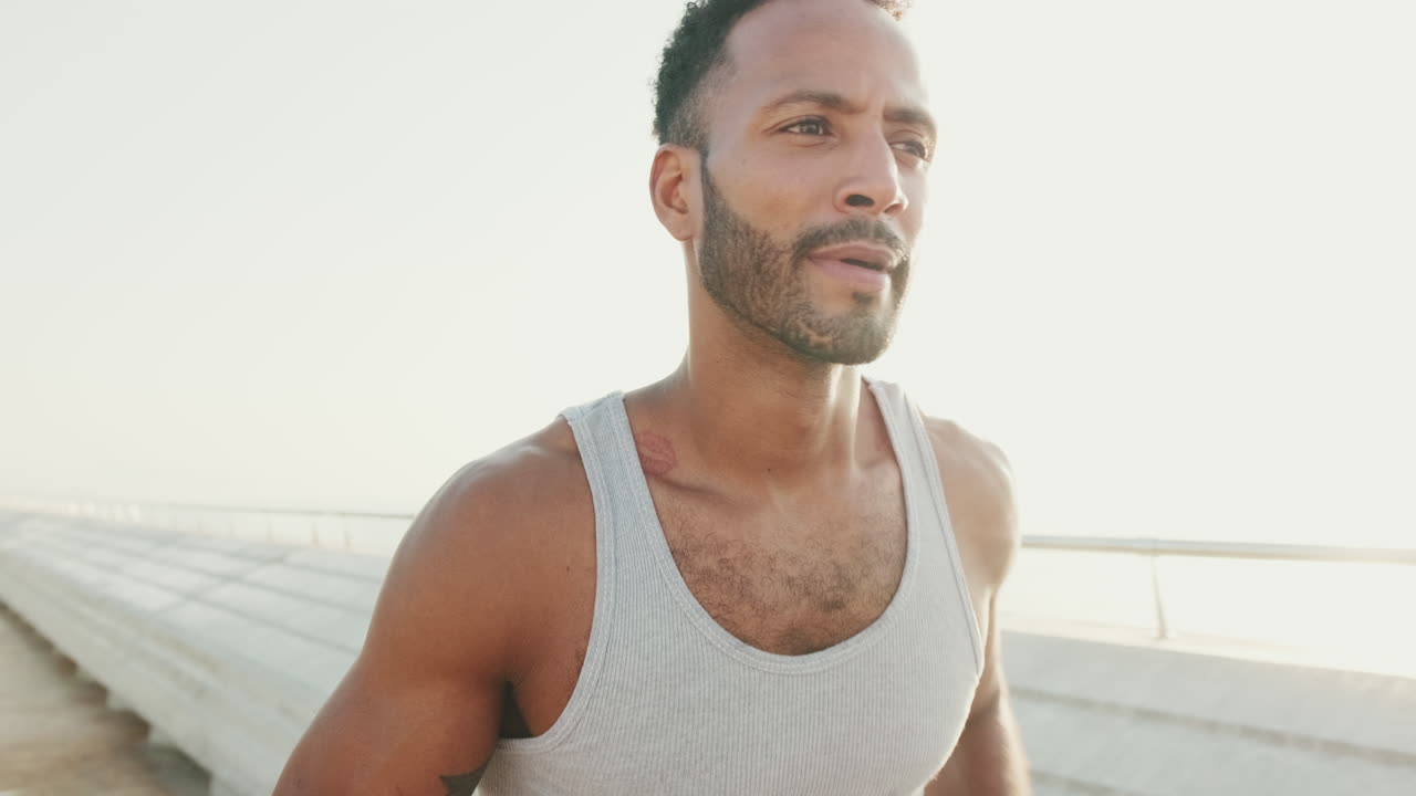 Man running outdoors for fitness