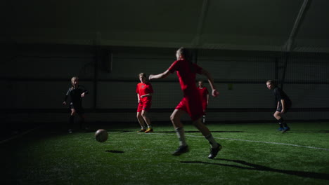 female soccer players practice indoors