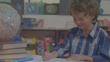 animation of spots over caucasian schoolboy writing