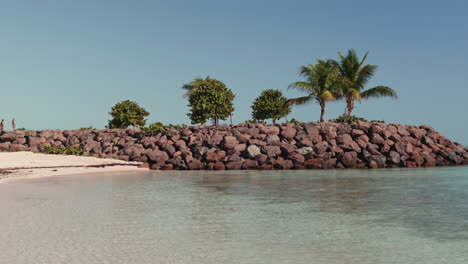 tropical island beach scene with pier