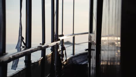 side railings, door and interior deck of a boat