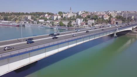 Branko-bridge-and-Kosancev-venac-in-summer-day,-aerial-4k-shot