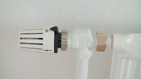 radiator know turning up heating, close up