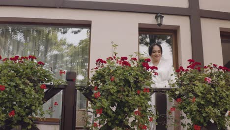 beautiful bride posing on balcony