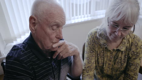 measuring blood pressure of an elderly patient