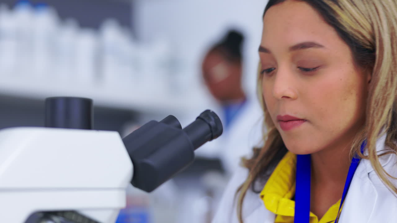 Woman, scientist with microscope