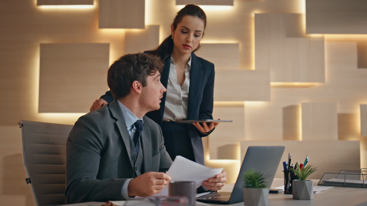 Office partners working together solving business. Closeup colleagues pondering