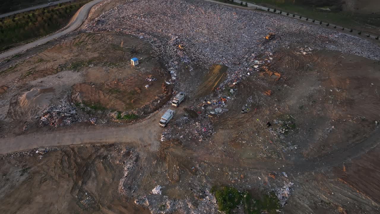 Aerial frame of an overflowing dumpsite affecting the environment