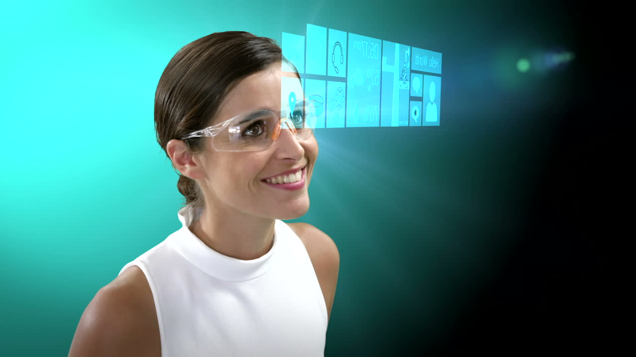 mujer de negocios mirando texto y gráficos generados digitalmente