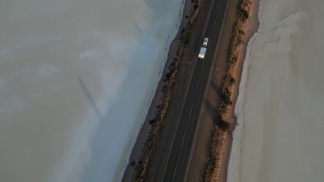 driving car with trailer on scenic road of australia