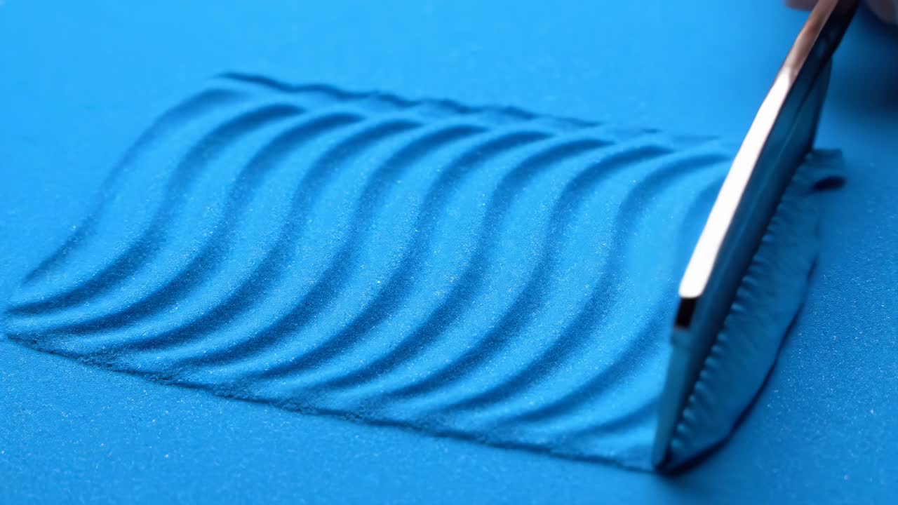 Cutting and Shaping Kinetic Sand with Razor