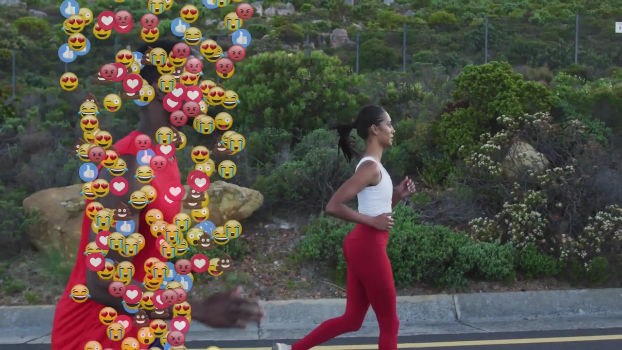 Coppia atletica che fa jogging all'aperto con emoji di reazione dei social media.